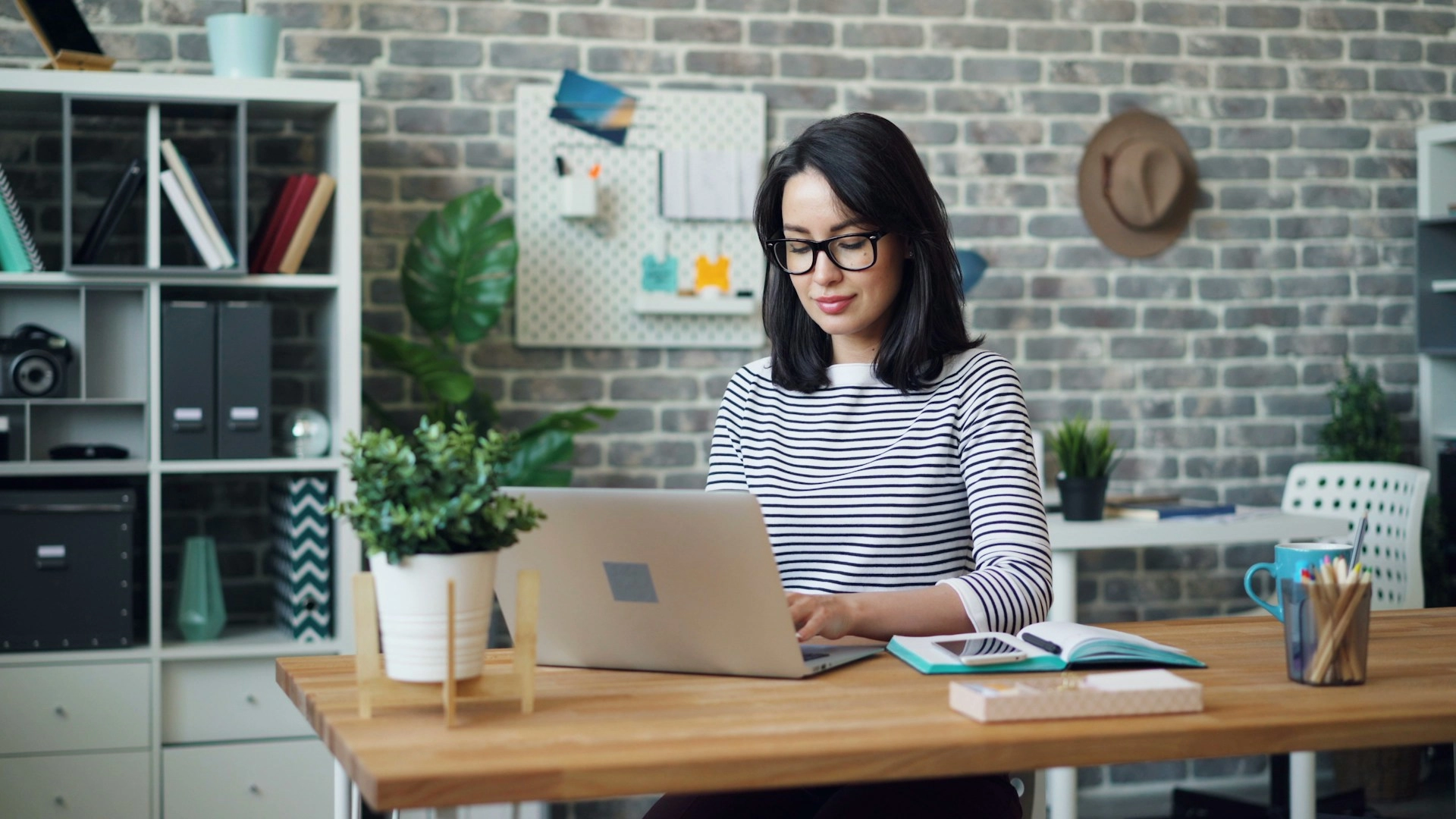 Woman looking at laptop