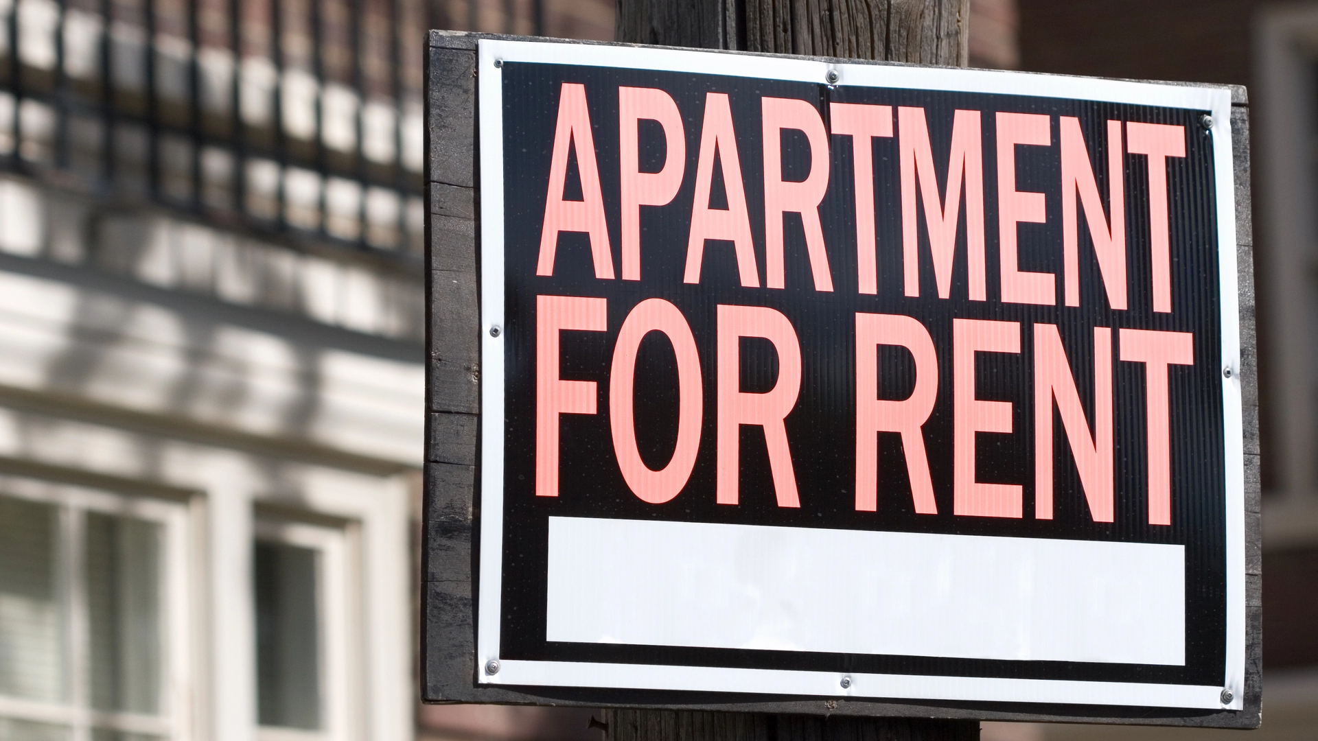 Sign that reads apartment for rent